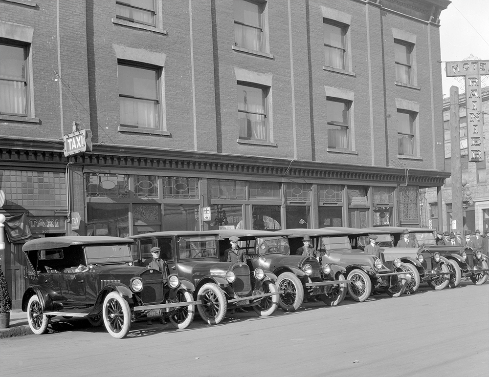 1920: Drivers proudly pose with their taxis. (Vancouver Archives)