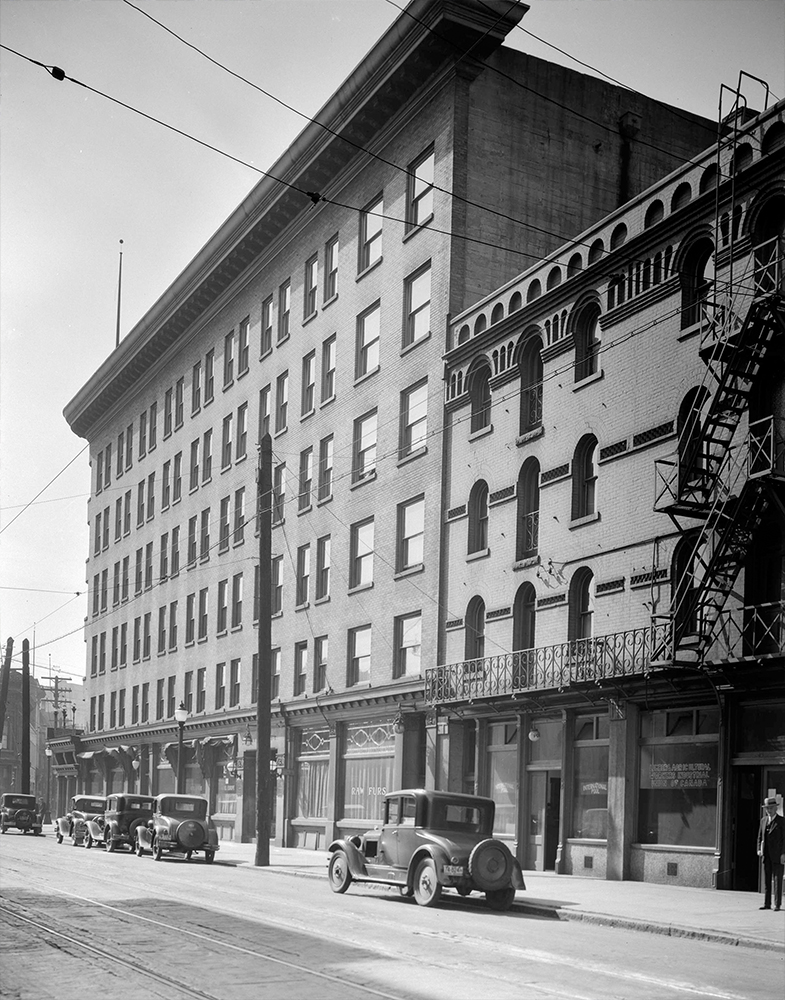 1931: Cars parked in front of the Hotel Europe. (Vancouver Archives)