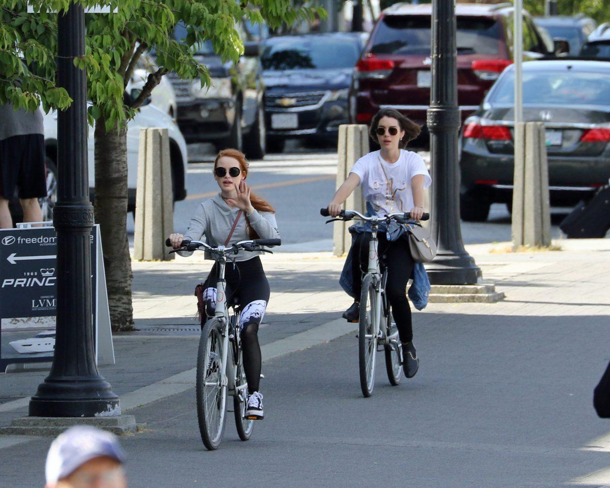 Madelaine Petsch and Adelaide Kane go for a bike ride in Vancouver