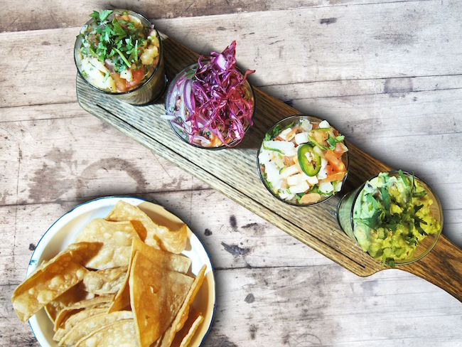 The Amigos Flight: white wild bass ceviche, octopus ceviche, delicious guacamole and pico de gallo at La Mezcaleria (La Mezcaleria/Facebook