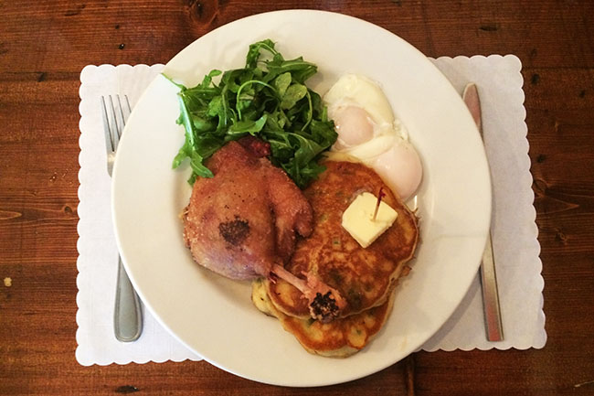 Brunch special: duck confit, poached eggs & green onion pancakes (Jess Fleming / Daily Hive)