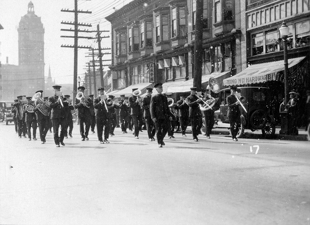 1927: A marching band takes part in the funeral parade of prominent Chinese-Canadian businessman Yip Sang. (Vancouver Archives)