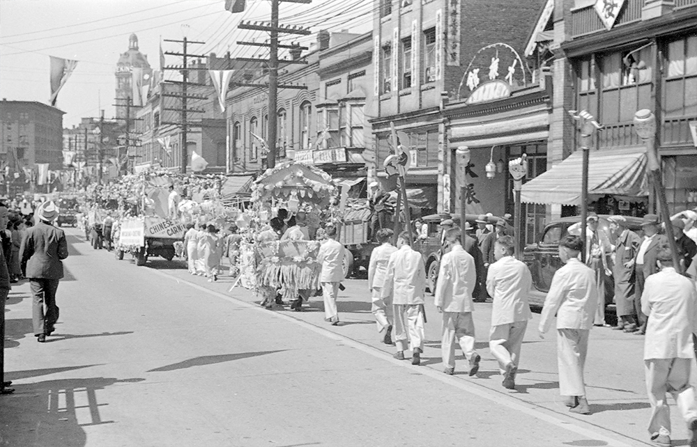 1936: A parade for the Chinese Carnival going down Pender Street. (Vancouver Archives)