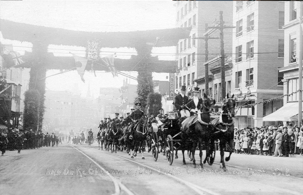 1912: The Duke and Duchess of Connaught pass under a welcoming arch erected by Vancouver's Japanese community on Hastings and Main. (Vancouver Archives)