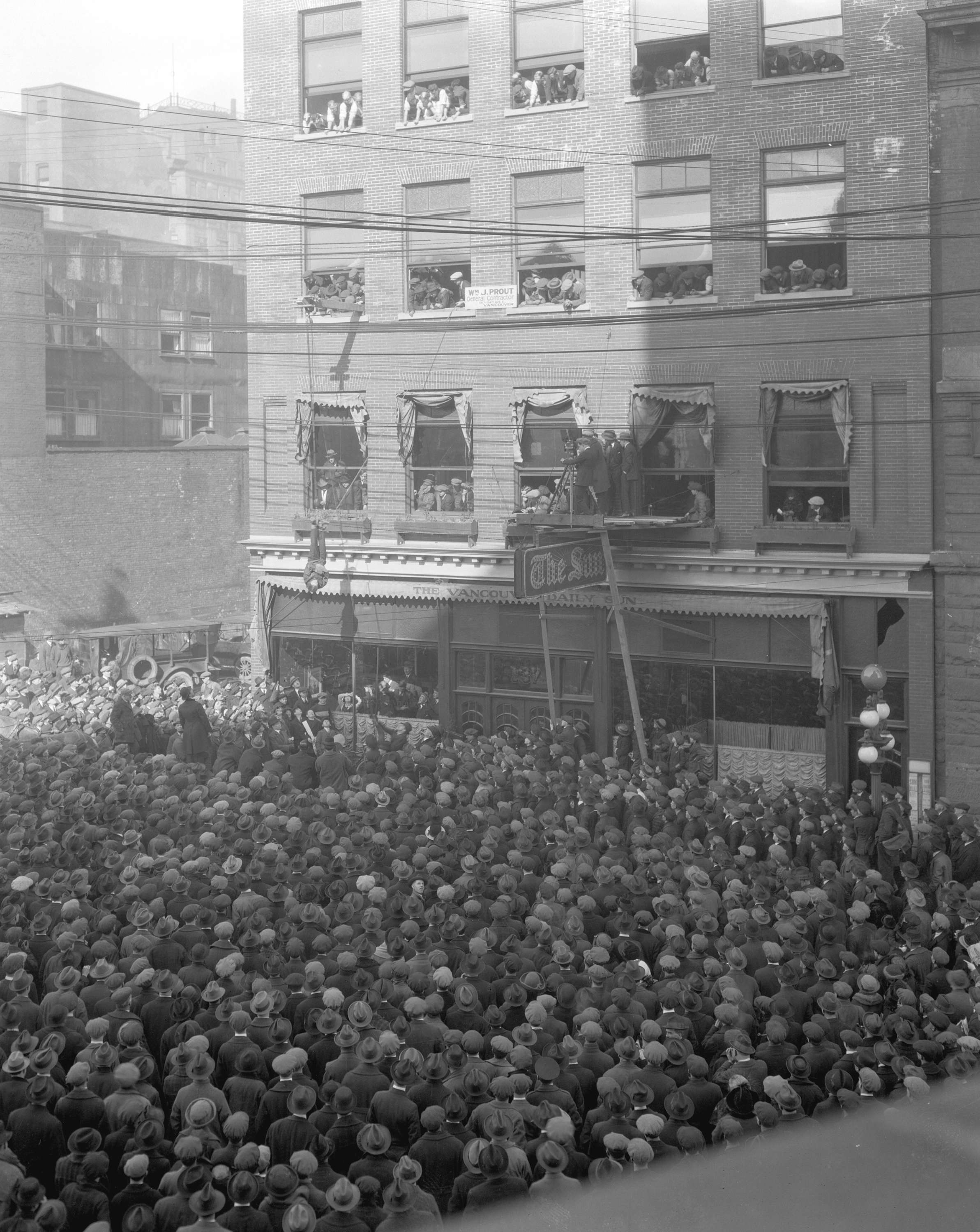 Harry Houdini hanging upside down in Vancouver