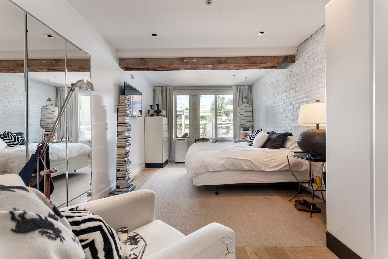 The master bedroom has classy brick walls (Angell Hasman & Associates (Eric Christiansen) Realty Ltd)