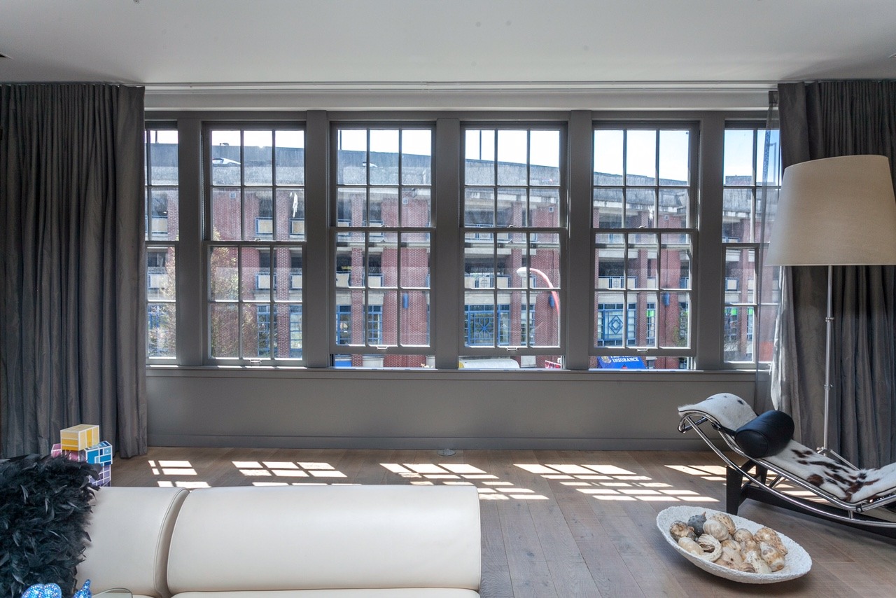 Large windows maximize the potential sunlight (Angell Hasman & Associates (Eric Christiansen) Realty Ltd)