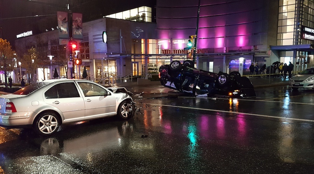 SUV flips over onto sidewalk in serious Cambie Street collision