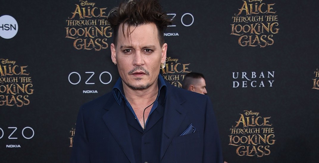 Johnny Depp arrives to the "Alice Through The Looking Glass" American Premiere on May 23, 2016 in Hollywood, CA