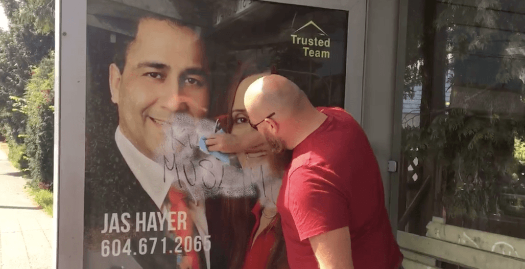 Vancouver man cleans racist graffiti off bus stop during his work day (VIDEO)