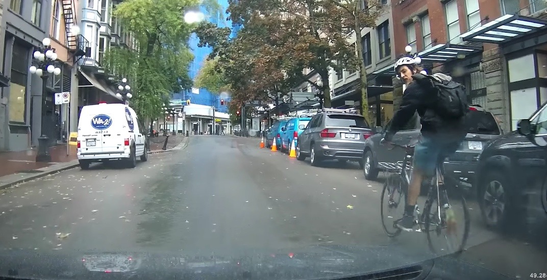 Aggressive Vancouver cyclist nearly hits pedestrian at crosswalk (VIDEO)