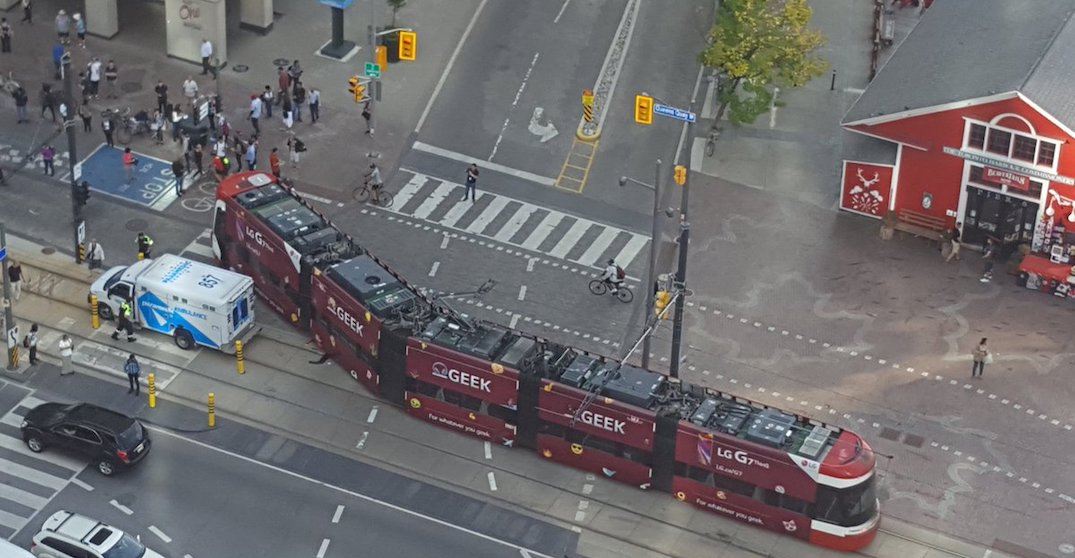 Streetcar derailed on Queens Quay after possible collision with ambulance (PHOTOS)