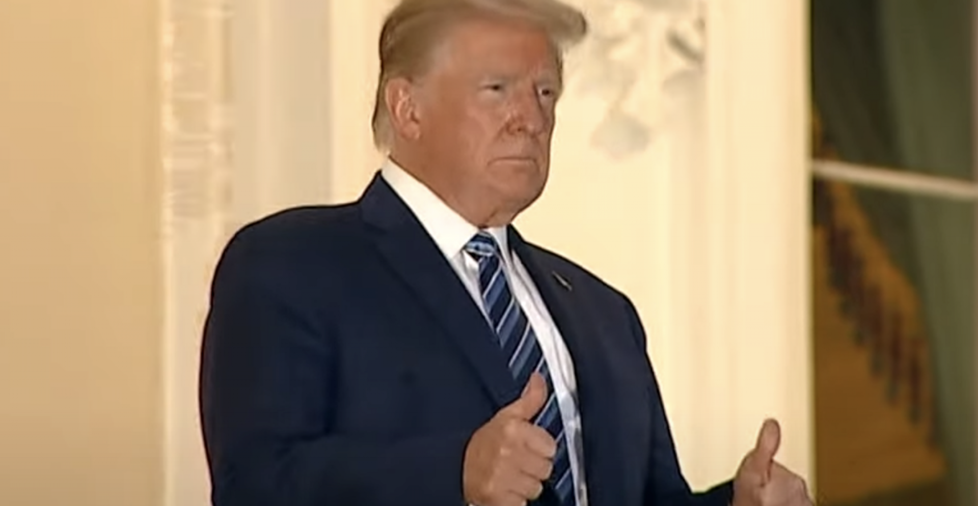 Trump takes off mask during return to the White House