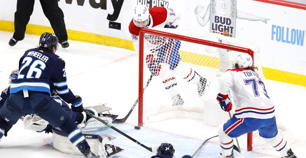 Suzuki's highlight-reel goal helps Canadiens top Jets in Game 1