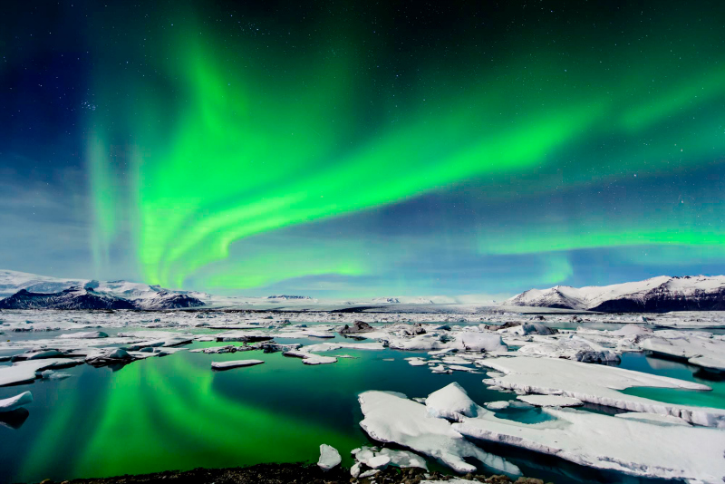 An aurora seen over the Grundarfjordur Harbor in Iceland. Photograph by Larry Gerbrandt / Barcroft USA