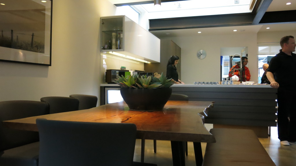 Image: Hand crafted dining table made by reclaimed wood materials.