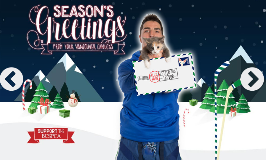 The Vancouver Canucks 2014 Christmas card features its most popular players cuddling cats. (Canucks)