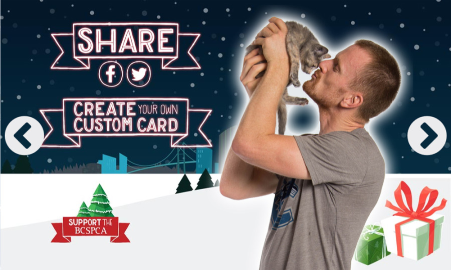 The Vancouver Canucks 2014 Christmas card features its most popular players cuddling cats. (Canucks)