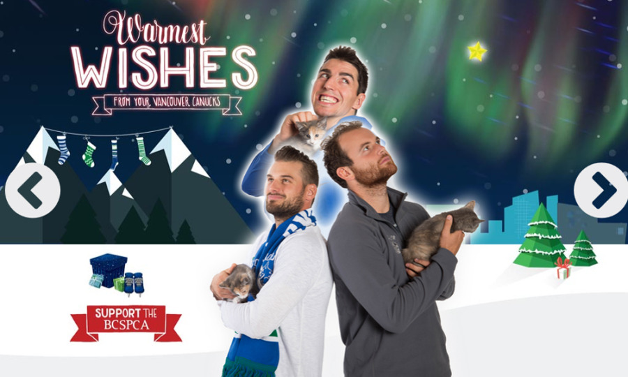 The Vancouver Canucks 2014 Christmas card features its most popular players cuddling cats. (Canucks)