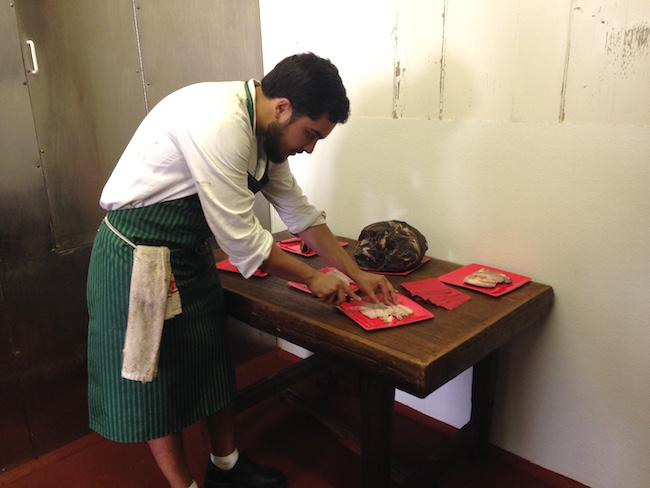 Carballo cuts some smoked cuts of Irish Bacon (Lindsay William-Ross/Vancity Buzz)