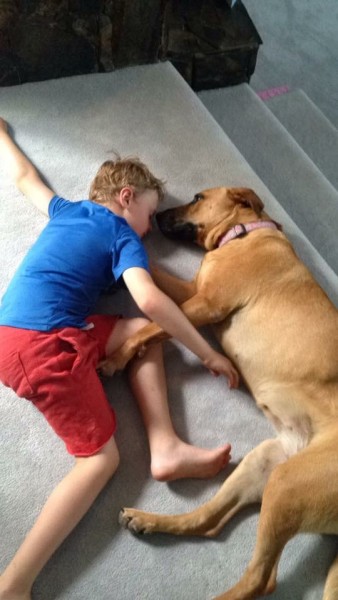 Luna having a snooze with Colton, 7.