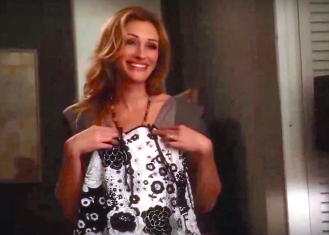 Julia Roberts holds up a Redfish Kids dress in "Eat Pray Love" (Screenshot)