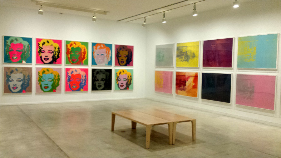Installation view of Andy Warhol’s series Marilyn, 1967 and Electric Chairs, 1971