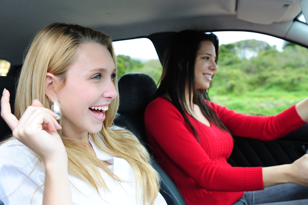 Singing in car / Shutterstock