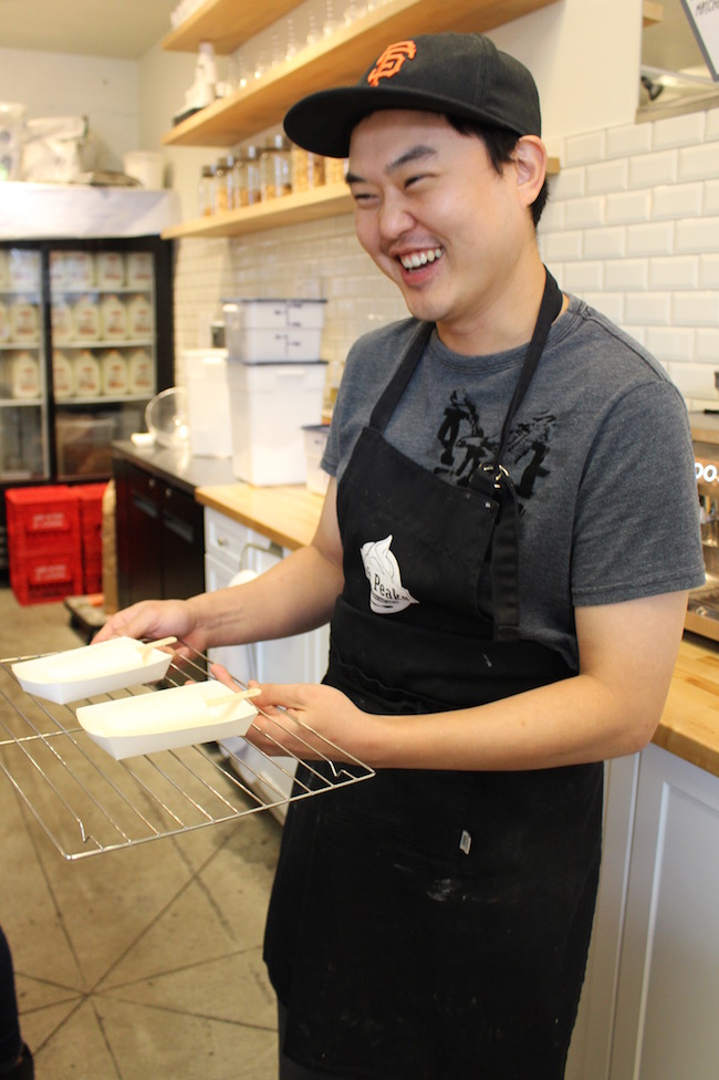 Soft Peaks co-owner Ken Kim brings out the housemade ice milk bars (Lindsay William-Ross/Vancity Buzz)